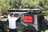 Suzuki Jimny fitted with the Alu-Cab Lightweight tent table slide, in the outdoors