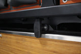 Close up view of the Alu-Cab Rear Door Drop Down Table, mounted to a camping vehicle