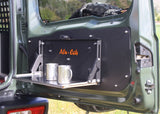 Alu-Cab Jimny rear drop down table with bamboo cutting board