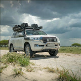 Front Runner Toyota Land Cruiser 200/Lexus LX570 Slimline II Roof Rack Kit, mounted on an off-road Camp 4x4 vehicle