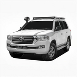 Front Runner Toyota Land Cruiser 200/Lexus LX570 Slimline II Roof Rack Kit, mounted on an off-road Camp 4x4 vehicle, on a white background