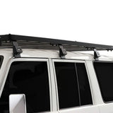 Front Runner Toyota Land Cruiser 76 Slimline II Roof Rack Kit, mounted on a LC76 Camp 4x4 off-road vehicle