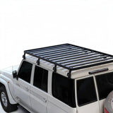 Front Runner Toyota Land Cruiser 76 Slimline II Roof Rack Kit, mounted on a LC76 Camp 4x4 off-road vehicle