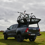 Toyota Hilux, double cab, fitted with Black Alu-Cab Explorer Canopy for double cab, with treaded or smooth finish. Camp4x4 camp 4x4, overlanding, camping. extra cab