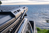 Vehicle with Alu-Cab Light weight tent, LT-50, fitted with the Alu-Cab Roof Molle Plate