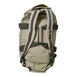 A beige 65 lt MEERKAT Travel Bag / duffel bag / waterproof backpack shown from the back, featuring multiple adjustable straps and buckles, photographed against a solid white background.