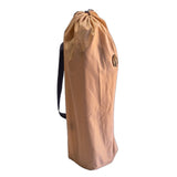 Meerkat Solid Arm Chair, with a 20kg weight capacity, folded up in the carry bag, on a white background