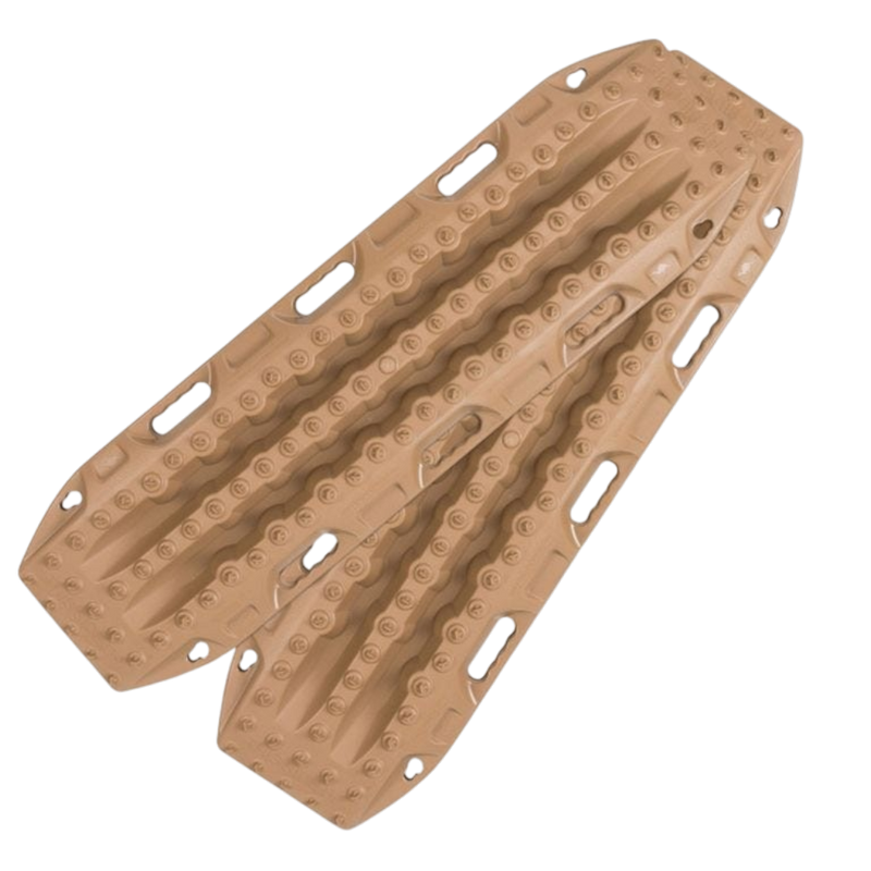 A pair of tan MaxTrax MKII with deep grooves and circular tread patterns, shown on a plain white background.