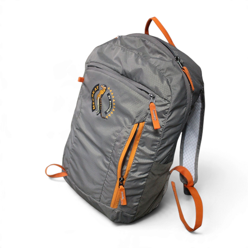 camp4x4.co.za - A gray lightweight Meerkat backpack with bright orange accents, including zippers, handles, and straps, featuring a circular logo patch on the front pocket.