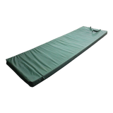A side view of a green MEERKAT Nylon Roll-Up Mattress, displayed on a white backround