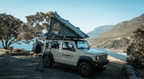 Suzuki Jimny Camp4x4 rental with Alu-Cab rooftop tent, ladder and bedding.