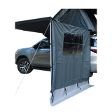 Car with a RoofPod Awning side, mounted tent attached to it on a white background