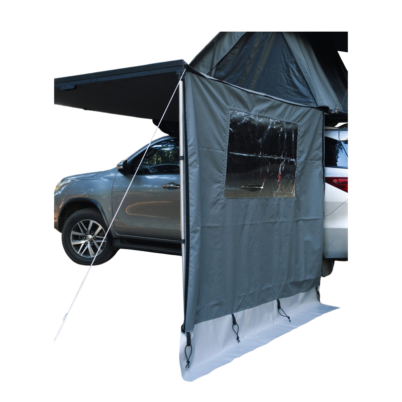 Car with a RoofPod Awning side, mounted tent attached to it on a white background