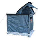 RoofPod Awning with the awning sides and door erected on a white background