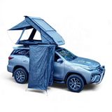 Car with a rooftop tent and a RoofPod Shower/Privacy Cube attached on a white background
