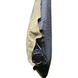 Close-up of a MEERKAT Self Inflating Mattress, showing two fabric coverings: a tan suede-like exterior and a dark gray dotted interior, with a black circular connector at the bottom, isolated on a white background.