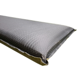 An upside down MEERKAT Self Inflating Mattress, with a subtle dotted grid pattern, shown at an angle against a plain white background.