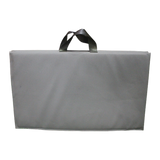 A gray MEERKAT Shooting Mat folded up into a rectangular soft-sided bag or cover with two dark gray handles, shown against a plain white background.
