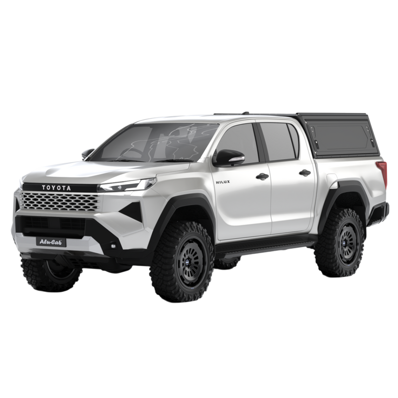 Alu-Cab Contour Canopy for the 2026+ Toyota Hilux Double Cab, mounted on the vehicle, on a white background