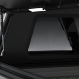 close up internal view of the Alu-Cab  Explorer Canopy with Tread Plate finish, for the  2026+ Toyota Hilux Double Cab