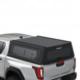 Alu-Cab Contour Canopy with side windows included, for the 2026 Toyota Hilux Double Cab, on a white background