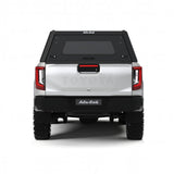 Alu-Cab  Explorer Canopy with Tread Plate finish, for the  2026+ Toyota Hilux Double Cab, on a white background