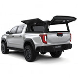 Alu-Cab  Explorer Canopy with Tread Plate finish, for the  2026+ Toyota Hilux Double Cab, on a white background