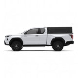 Side view of the Alu-Cab Contour Canopy without side windows, for the 2026+ Toyota Hilux Extra Cab, mounted on the vehicle, on a white background