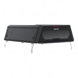 Alu-Cab Contour Canopy, with no side windows, for the 2026+ Toyota Hilux Extra Cab, mounted on the vehicle, on a white background