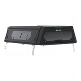 Alu-Cab Contour Canopy, with side windows, for the 2026+ Toyota Hilux Extra Cab, mounted on the vehicle, on a white background