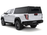 A white Toyota Hilux 2026+ Extra Cab with a Alu-Cab Explorer Canopy, with a smooth finish, over the bed, shown from a low three-quarter rear angle on a white background.