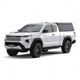 A white Toyota Hilux 2026+ Extra Cab with a Alu-Cab Explorer Canopy, with a smooth finish, over the bed, shown from a three-quarter front angle on a white background.