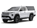 A white Toyota Hilux 2026+ Extra Cab with a Alu-Cab Explorer Canopy, with a tread plate finish, over the bed, shown from a three-quarter front angle on a white background.