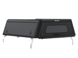 Alu-Cab Explorer Canopy, with a tread plate finish for the Toyota Hilux 2026+ Extra Cab on a white background.