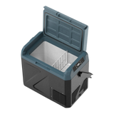 A Zalptic Z19 Carry Fridge Freezer with an open lid, featuring a dark gray exterior, a slate blue-gray lid, a stainless steel interior, and a wire cooling rack. Portable Fridge / freezer