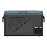 A rugged black Zalptic Z61 Camping Fridge Freezer with a dark teal lid, featuring a large stylized 'Z' logo on the front and a vented control panel on the lower right, shown against a plain white background.