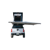 Camping vehicle with extended Alu-Cab 270 Shadow Awning RHS and a Gen3.R rooftop tent. Camp4x4. camp 4x4, overlanding. Double Cab. Single Cab. Extra Cab