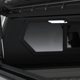 Interior view of camp4x4.co.za Alu-Cab Contour Canopy featuring integrated LED lighting and side window access
