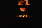 CAMP4X4 logo etched into braai with glowing embers