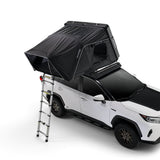 A black iKAMPER Skycamp 4.0 Trio, 3 sleeper, rooftop tent mounted on top of a white SUV with a silver ladder, shown on a clean white background.