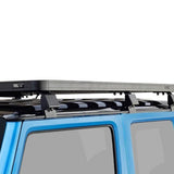 Front Runner Suzuki Jimny Slimline II Roof Rack on a blue jimny 3 door